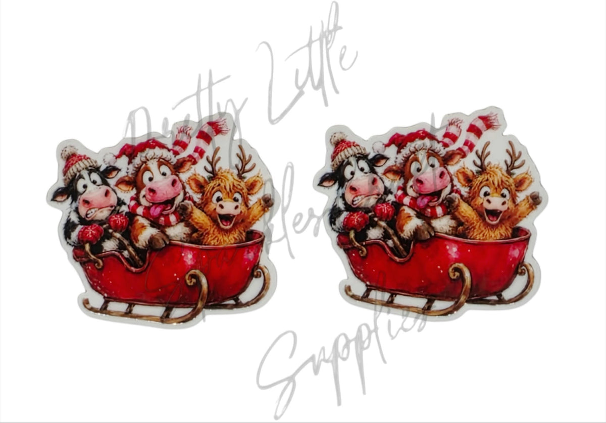 Whimsical Cows on Sleigh